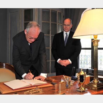 H.E. M. Michel Roger takes the oath of allegiance.